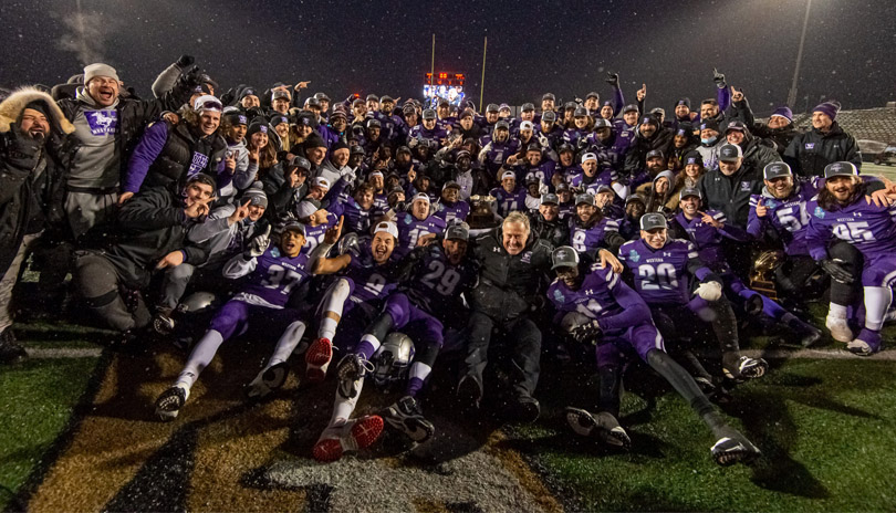 Western Mustangs full team and coaching staff celebrating the victory of the 2021 Vanier Cup