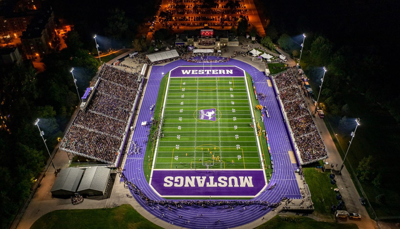 Aerial view of a Western Alumni Stadium during a Western Mustangs football game with a full audience attendance in the stands