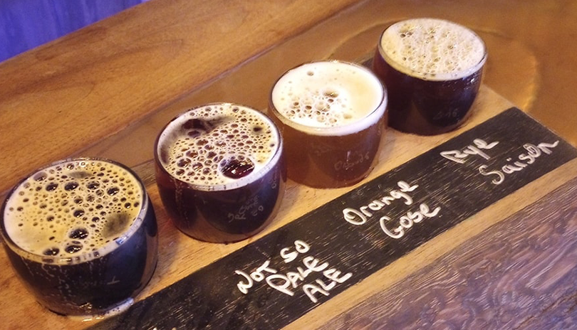 A beer flight with four local drinks at Dndas and Sons in London, Ontario