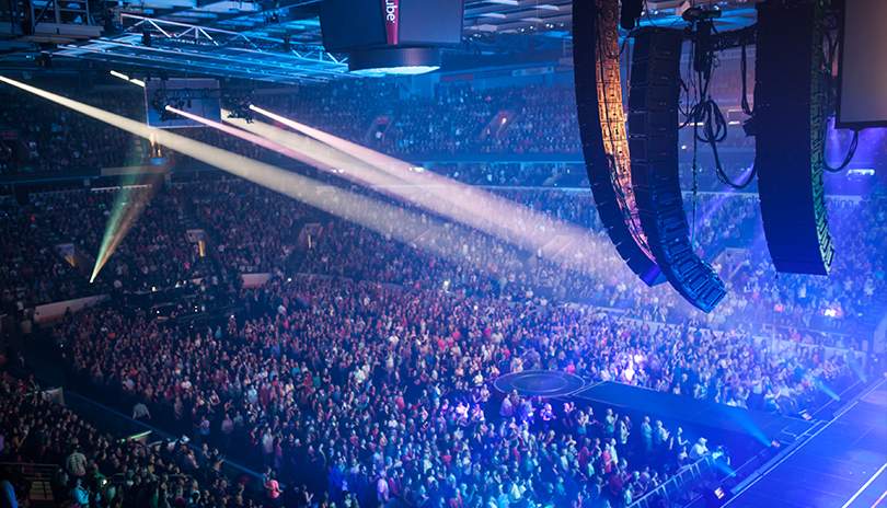 Large crowd enjoing an energetic concert at Canada Life Place in London, Ontario
