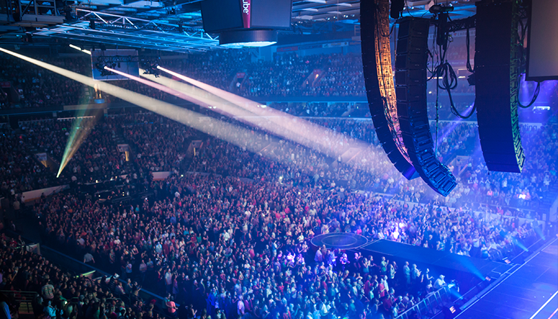 Large crowd enjoing an energetic concert at Budweiser Gardens in London, Ontario