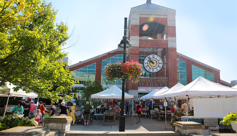 Outdoor market with fresh food vendors at Covent Garden Market