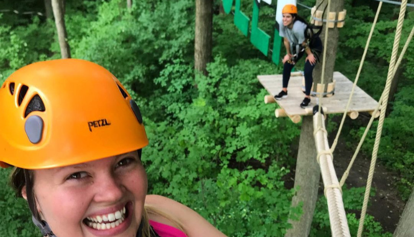 Ladies climbing at Boler Mountain Treetop adventures