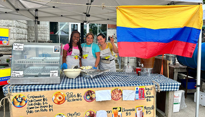 Vendor serving authentic Colombian cuisine