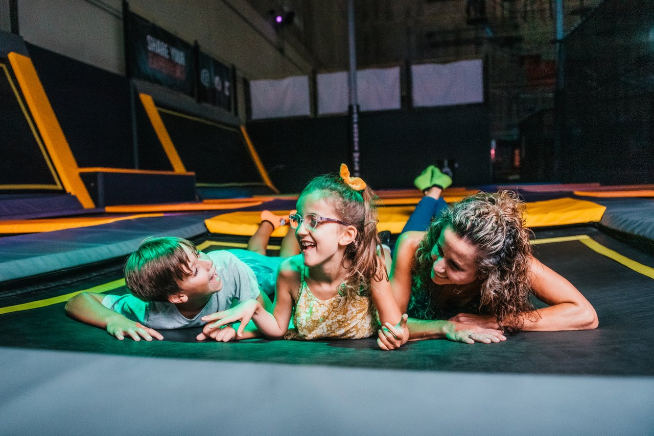 People playing on a trampoline at 100 Kellogg Lane's The Factory