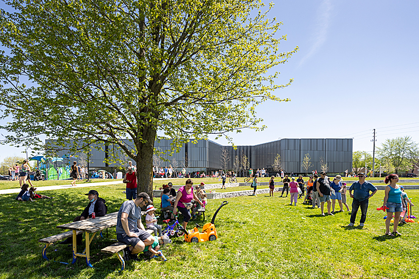 Groups of people outside of the East Lions Community Centre