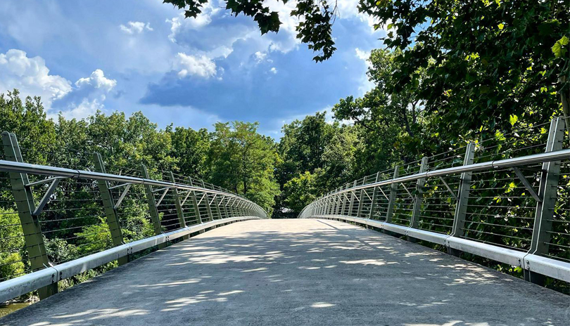 The pedestrian bridge over the Thames River at Gibbons Park in London, Ontario