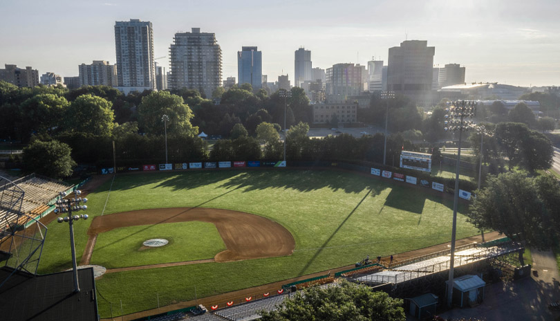 Aerial view of Labatt Park with the skyline of the city of London, Ontario in the background