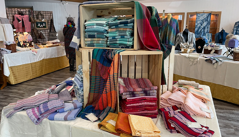 A variety of textiles placed on a table