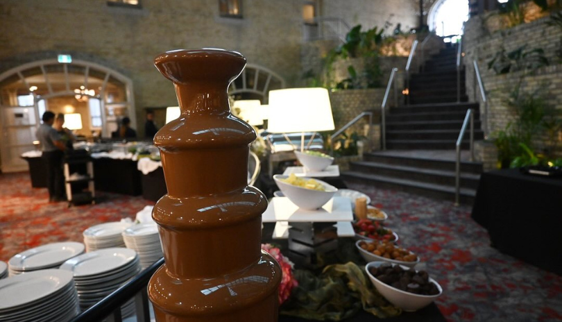 Chocolate fountain with many fruits and snacks at The Armouries Grille
