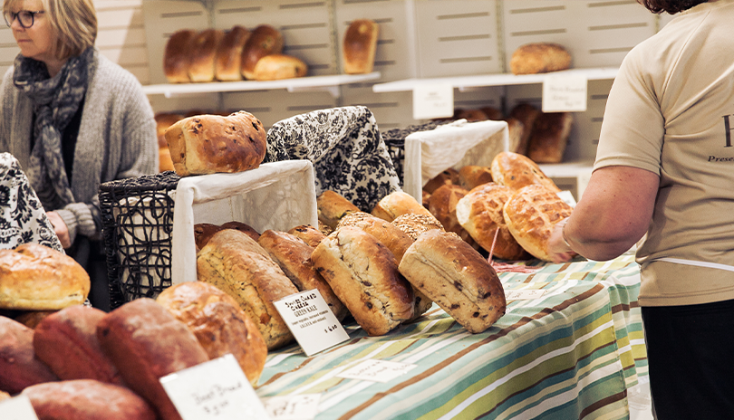 Fresh Bread spread on a table at The Market at Western Fair District