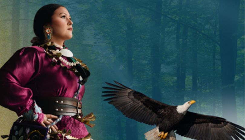Figure in ornate magenta attire stands with soaring eagle in misty forest scene.