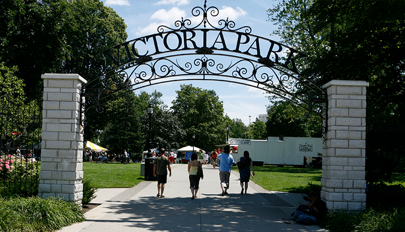 Family entering the scenic Victoria Park in London, Ontario