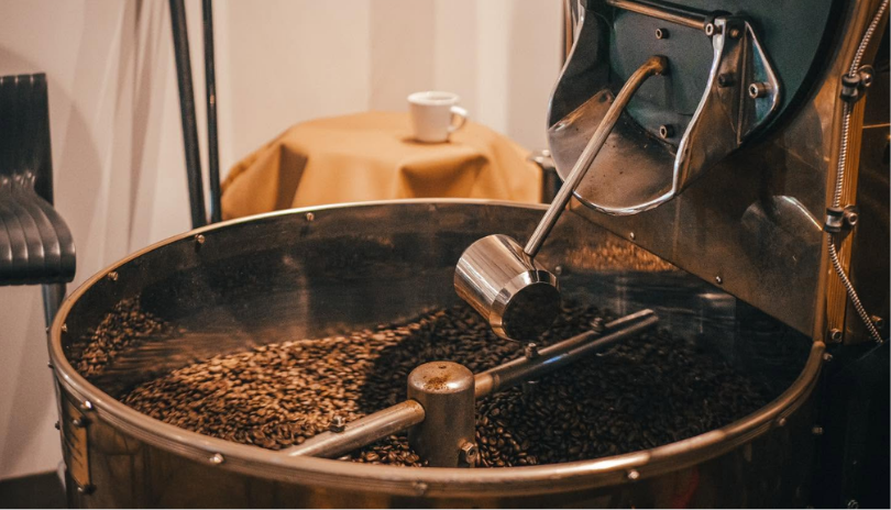 A coffee roaster machine in action.