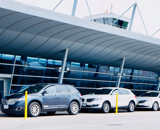 cars parked infront of London Airport