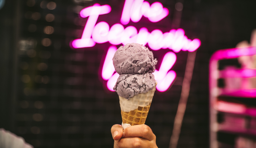 hand holding an ice cream cone