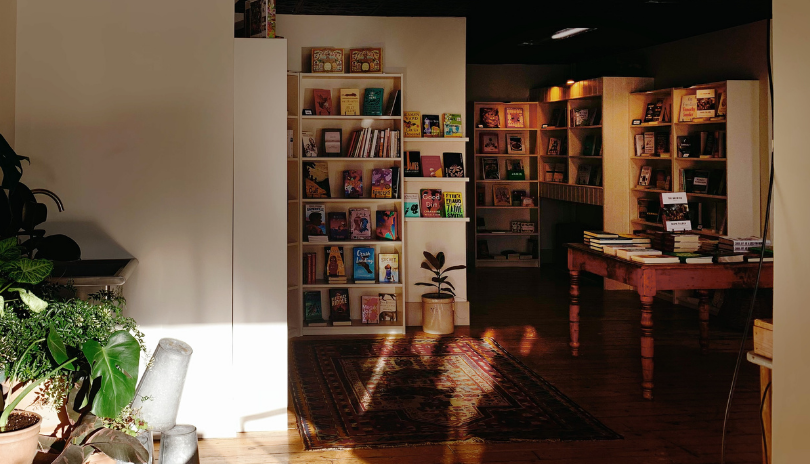 A warmly lit bookstore.
