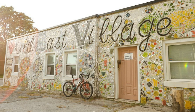 A large wall mosaic that says Old East Village in London, Ontario.