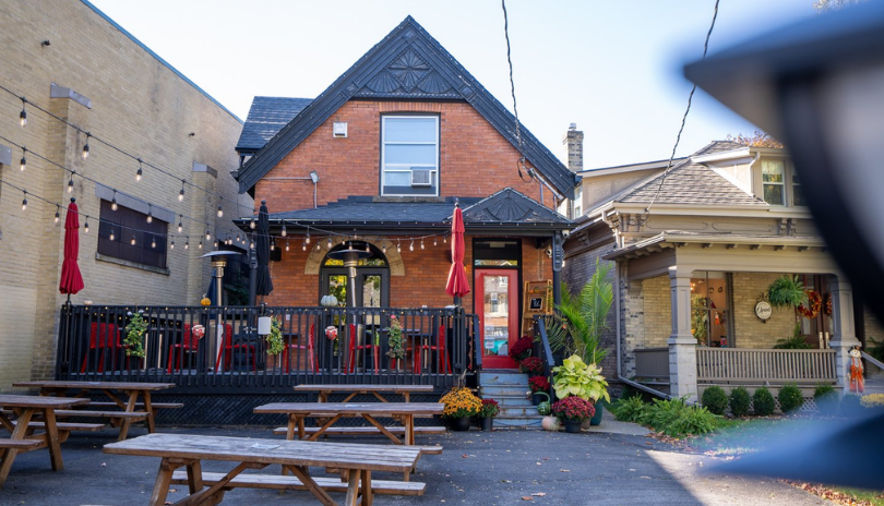 The patio and exterior of a Sagi of Wortley, a restaurant located in London, Ontario's Wortley Village.
