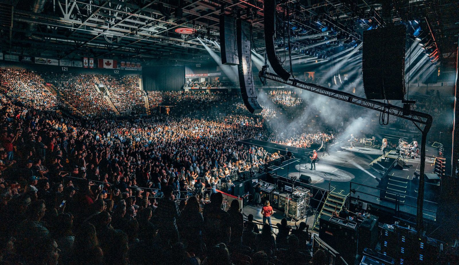 concert stage with musicians infront of audience