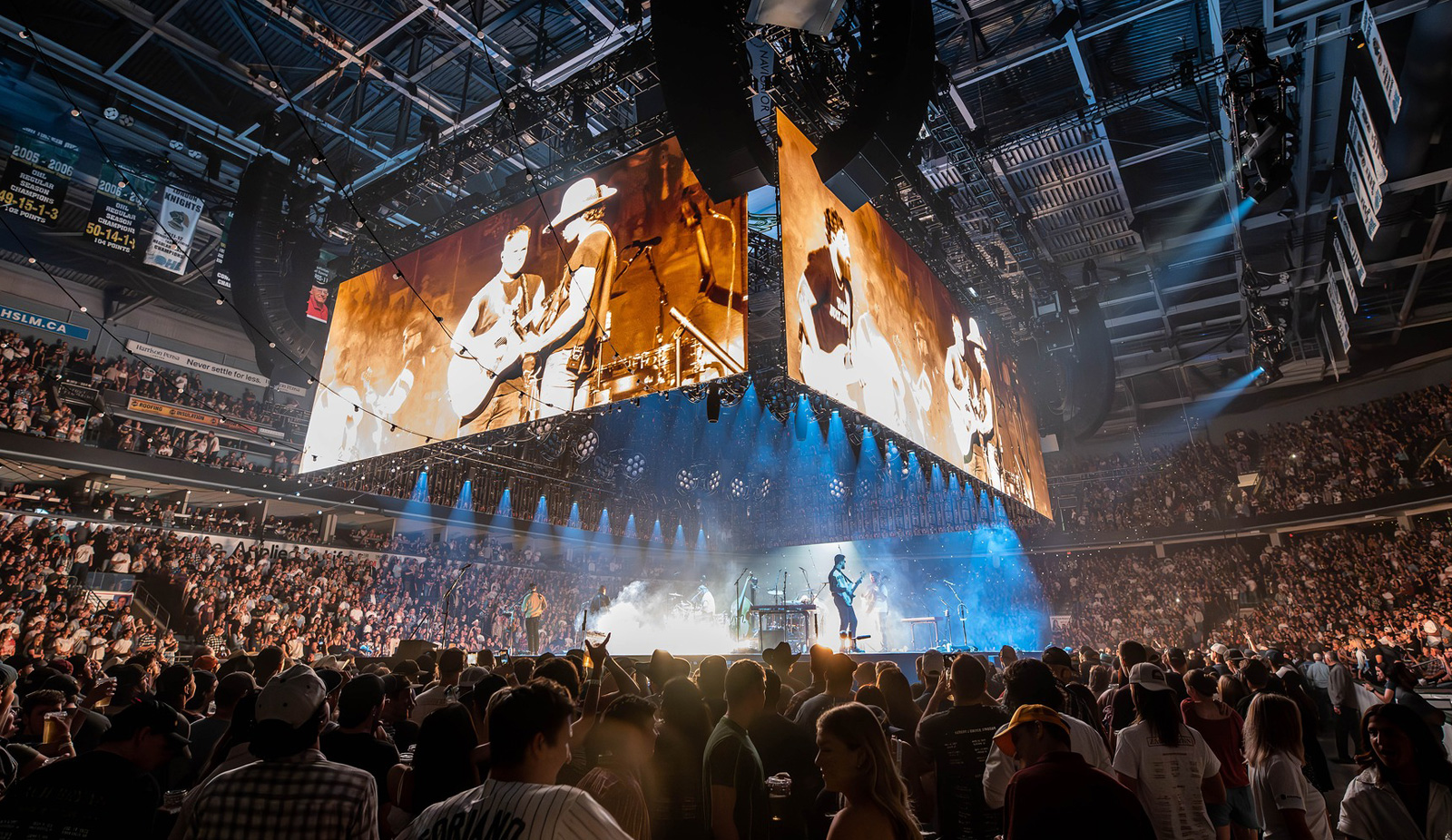 concert stage with musicians infront of audience