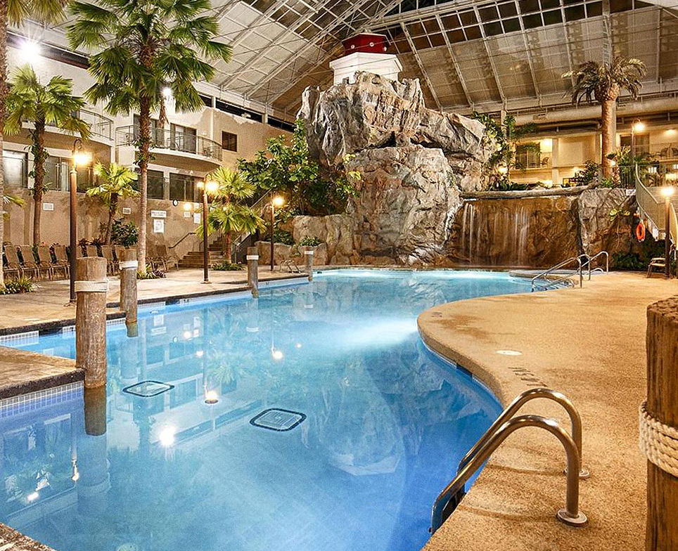 swimming pool atrium at best western plus lamplighter inn & conference centre