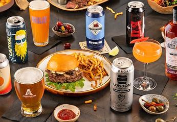 A table top view of various beers and pub type food from London, Ontario