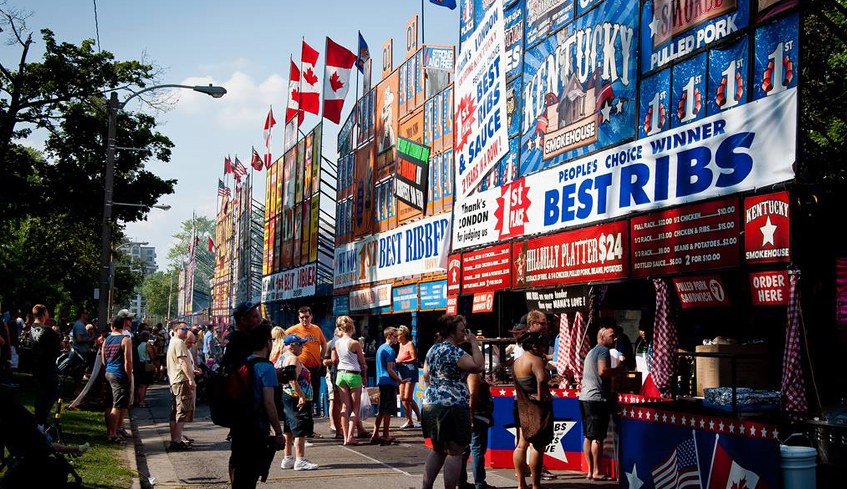 People lining up to purchase Ribs from various vendors at the annual London Ribfest & Craft Beer Festival held in London, Ontario