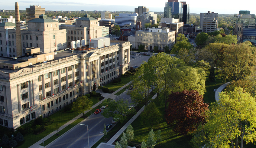 An aerial view of the London Life building across from Victoria Park on a sunny day in the Summer in London, Ontario