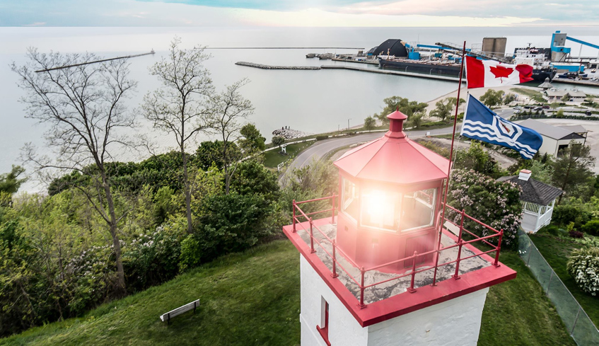 An aerial view from the top of a lighthouse overlooking a body of water in Goderich, Ontario